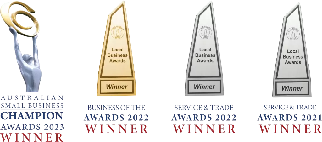 Award trophies for Australian Small Business Champion 2023, Local Business Awards 2022, and 2021 Service & Trade Awards.